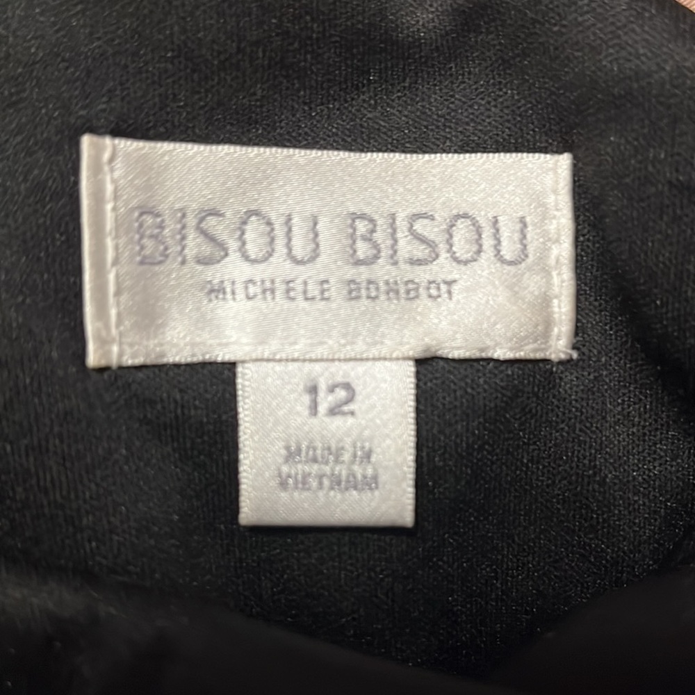 Beautiful, black and cream dress with leather, like detail on the back - Picture 6 of 7